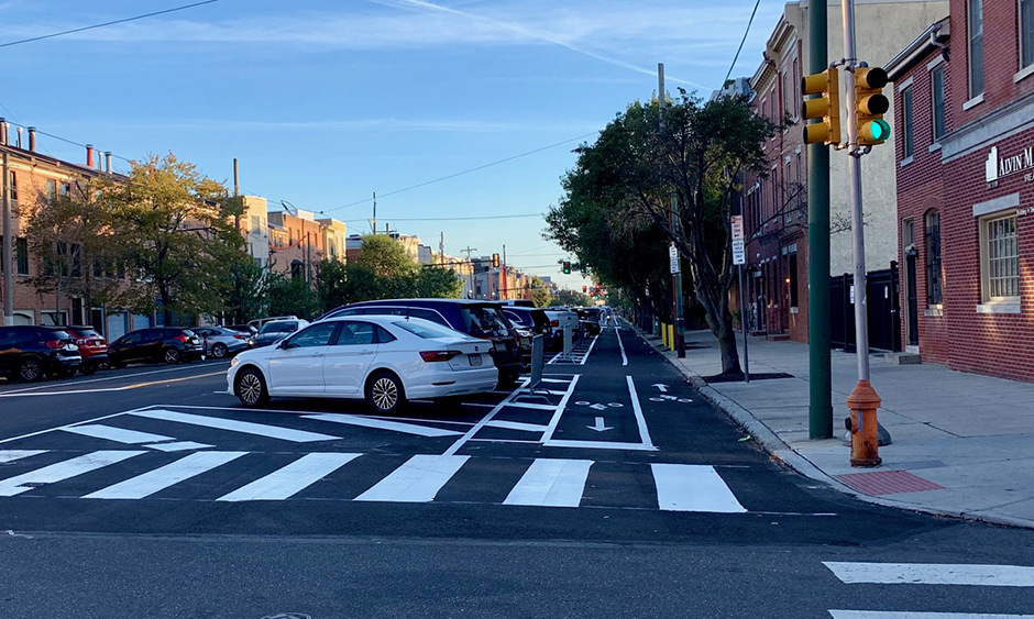 Two-way bike lane separated by parked cars