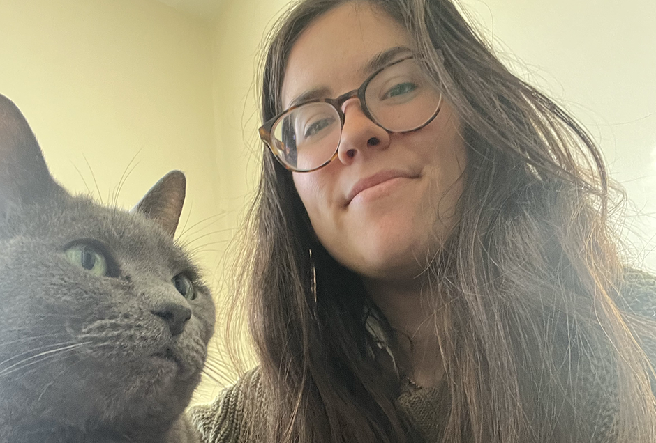 Headshot of staff member Alyssa Driscoll with her cat