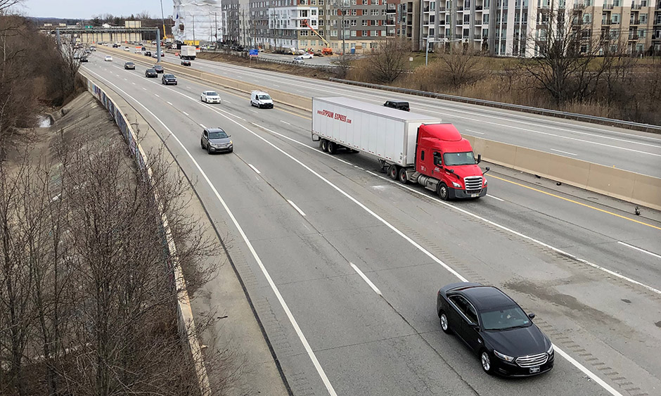 A semi-truck hauling freight on a highway
