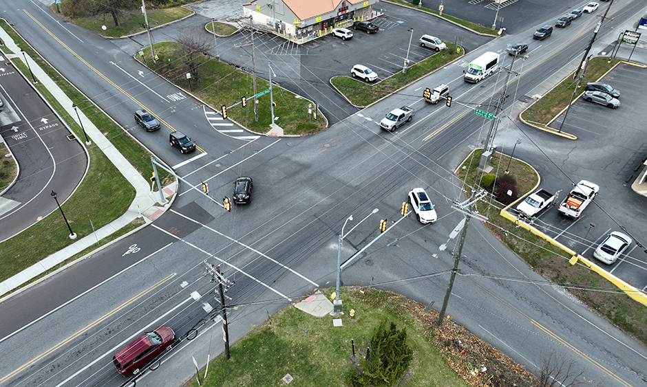 An aerial view of a four-way intersection