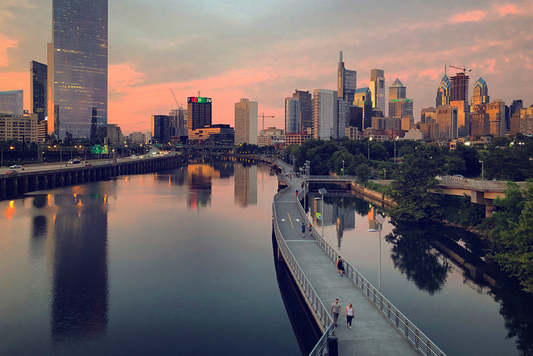 A photograph the Schuylkill River taken from the South Street Bridge at sunset